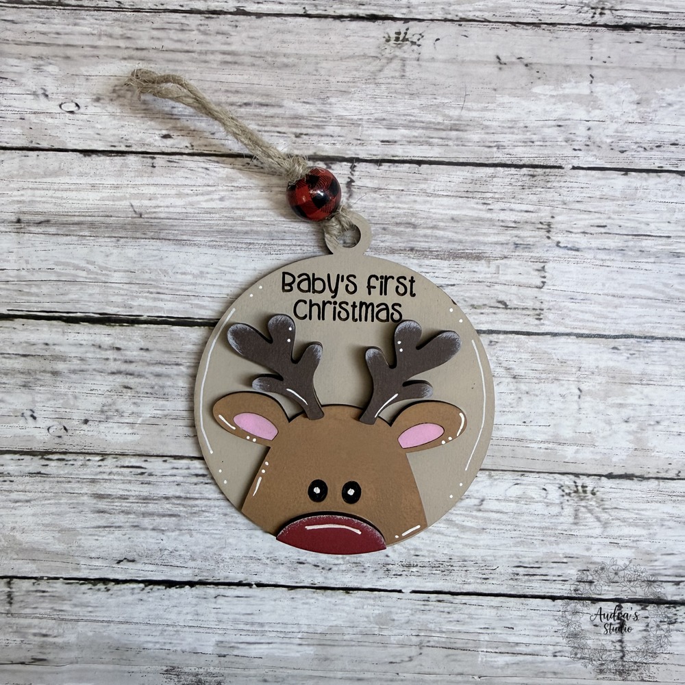 Hand-painted Baby's First Christmas reindeer ornament, larger face, red nose and jute hanger with a red bead
