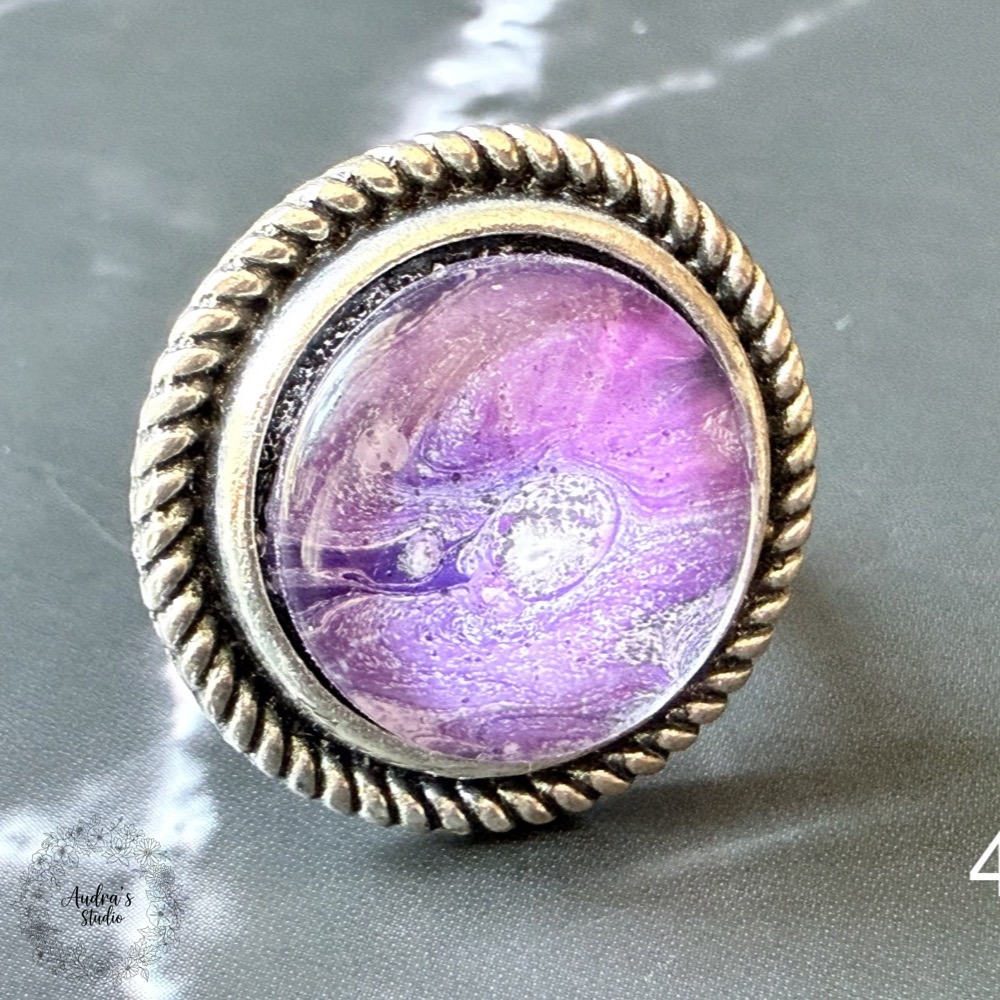 Hand-poured acrylic fluid art ring number 4 in an antique silver adjustable rope-edge setting