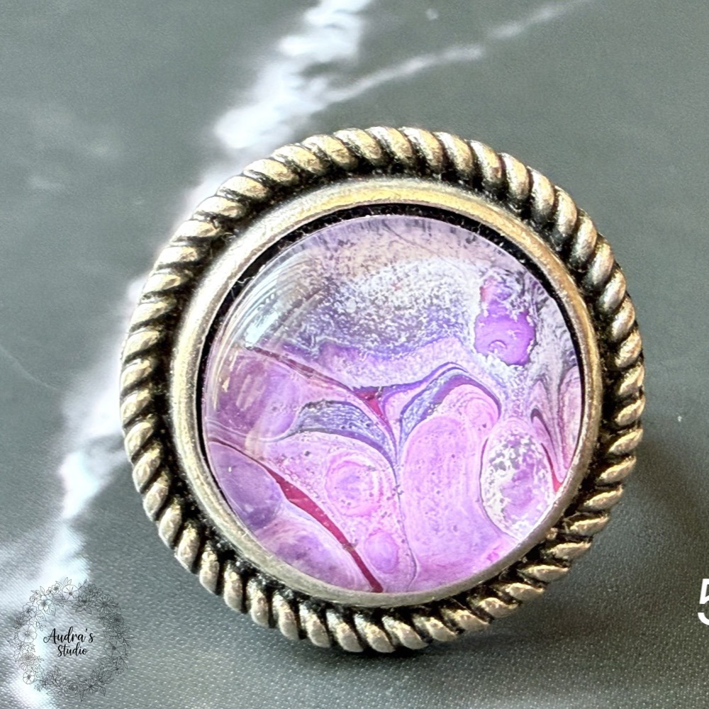Hand-poured acrylic fluid art ring number 5 in an antique silver adjustable rope-edge setting