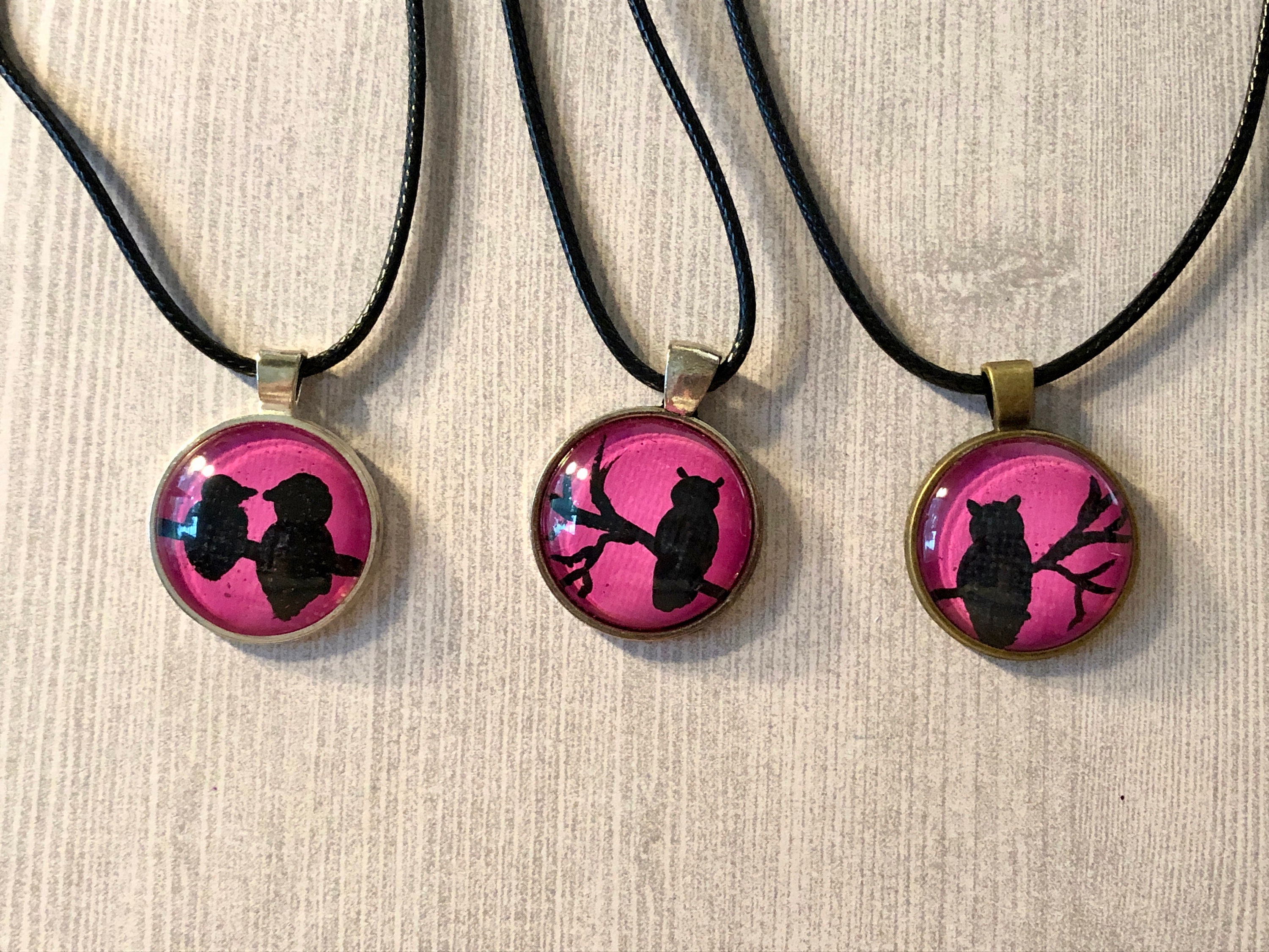 Owl and raven pendant necklace