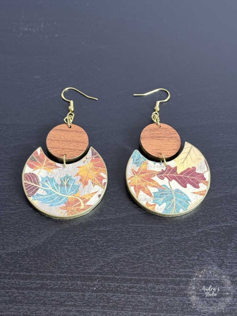 Autumn leaf crescent earrings in laser-cut wood with gold painted edges